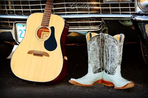 Guitar and cowboy boots