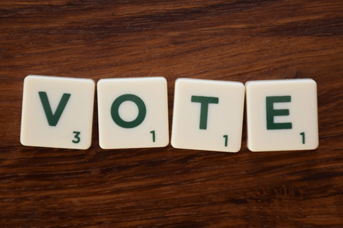 HIS_elections Scrabble tiles spelling Vote