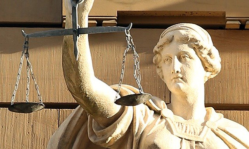 Statue of Justice holding the scales