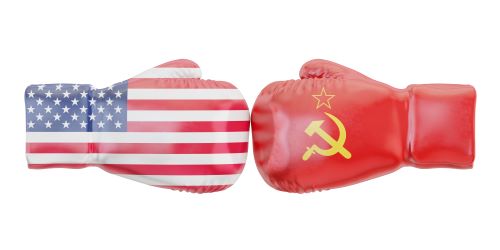 US flag boxing glove hitting Russian boxing glove