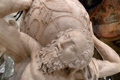 Art: Sculpture Sculpture of bearded man carrying world on his back