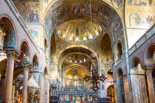 Luxury interior of Saint Mark's Basilica with gold and lots of mosaics. Venice, Italy