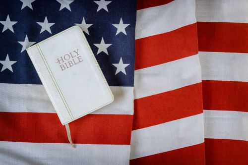 Holy Bible on American flag