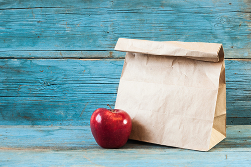 Hold" paper bag on old wooden background "Hold" paper bag on old wooden background