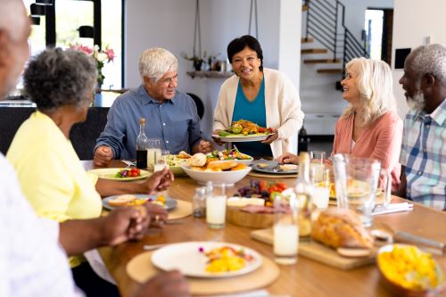 Older adults having breakfast as a group