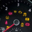 Up close of car dashboard with warning lights