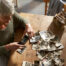 Image of a woman looking at a box of photos