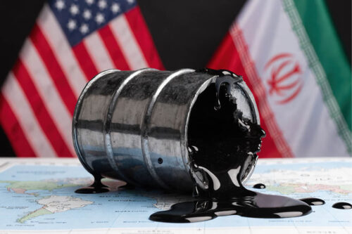 Barrel of oil in front of American flag