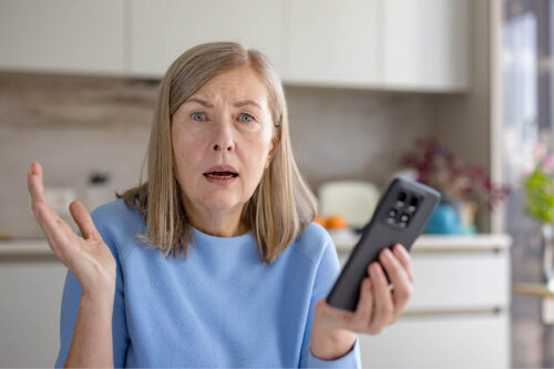 Woman holding smartphone