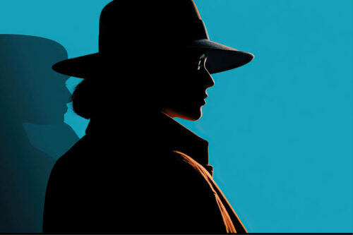 Silhouette of woman wearing a fedora