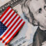 American flag and 20 dollar bill zoomed in on Andrew Jackson