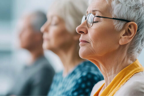 group of women meditating