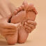 Person massaging their feet