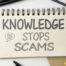 Notepad with words "Knowledge stops scams"