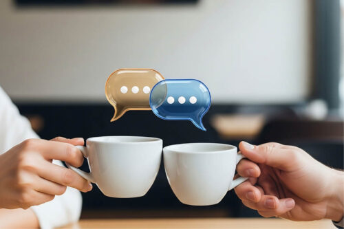 two people clinking their cups of coffee with speech bubbles above the cups