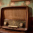 brown retro radio sitting on vanity