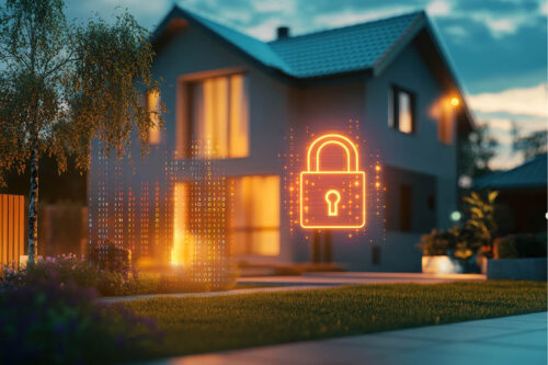 Lit up house at night with lock