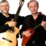 Photo of a guitar player and a balalaika player